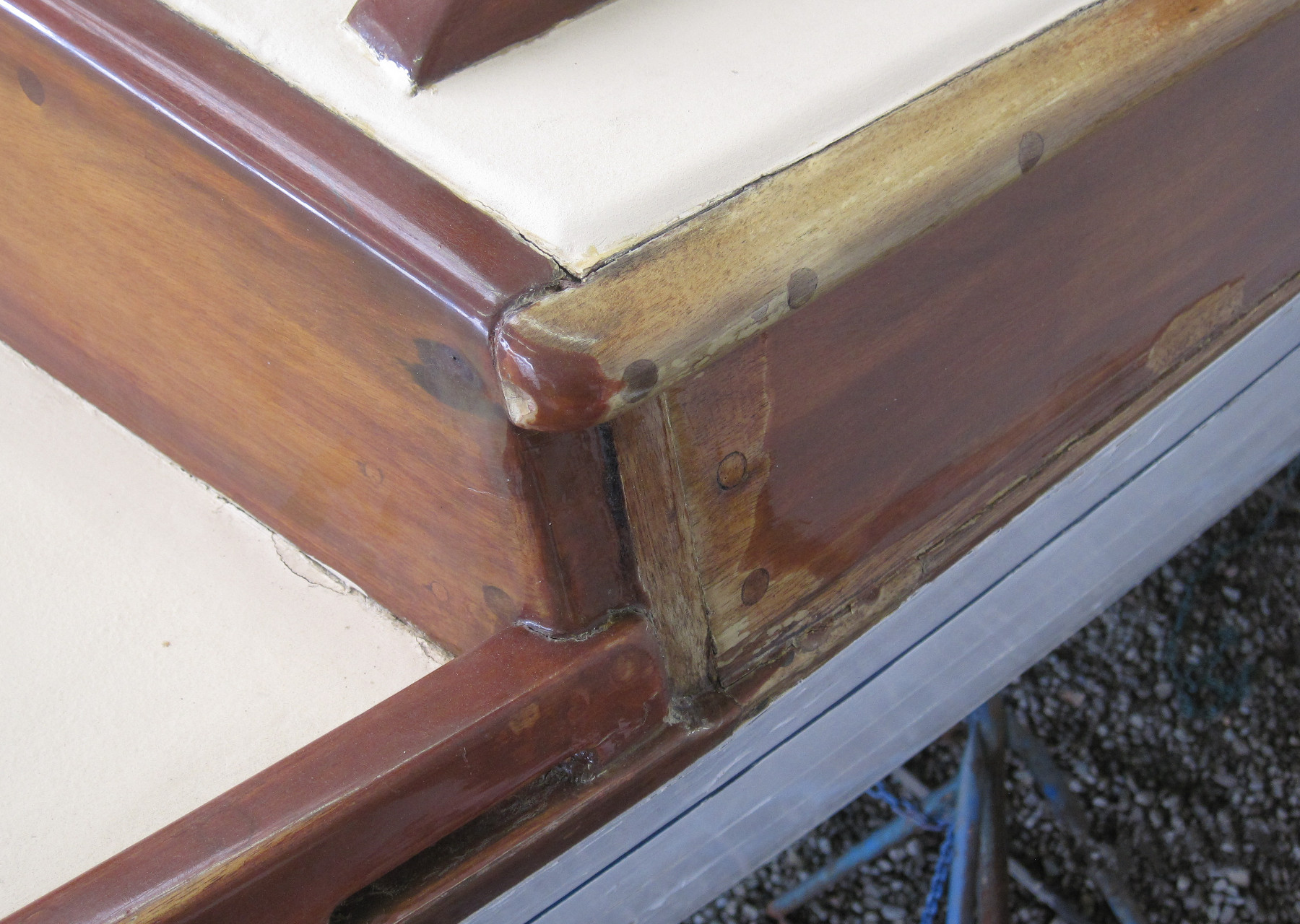 Wooden Boat Restoration - Kestrel - Kestrel's cabin post as well as the house wood was in distress.
