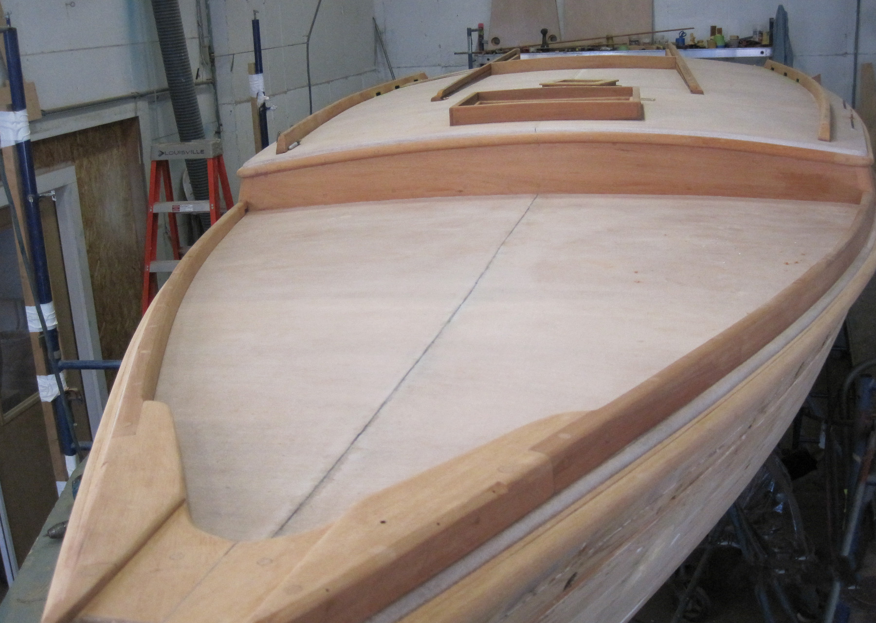 Wooden Boat Restoration - Kestrel - House woodwork finished, toerails installed.